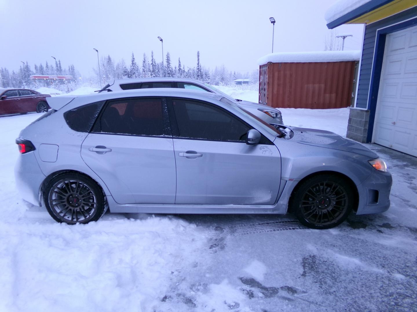 2013 Silver /Black Subaru Impreza WRX STI WRX STI (JF1GR8H66DL) with an 2.5L EJ257 4-Cyl Boxer Turbo engine, 6-Speed Manual transmission, located at 2630 Philips Field Rd., Fairbanks, AK, 99709, (907) 458-0593, 64.848068, -147.780609 - Photo#2